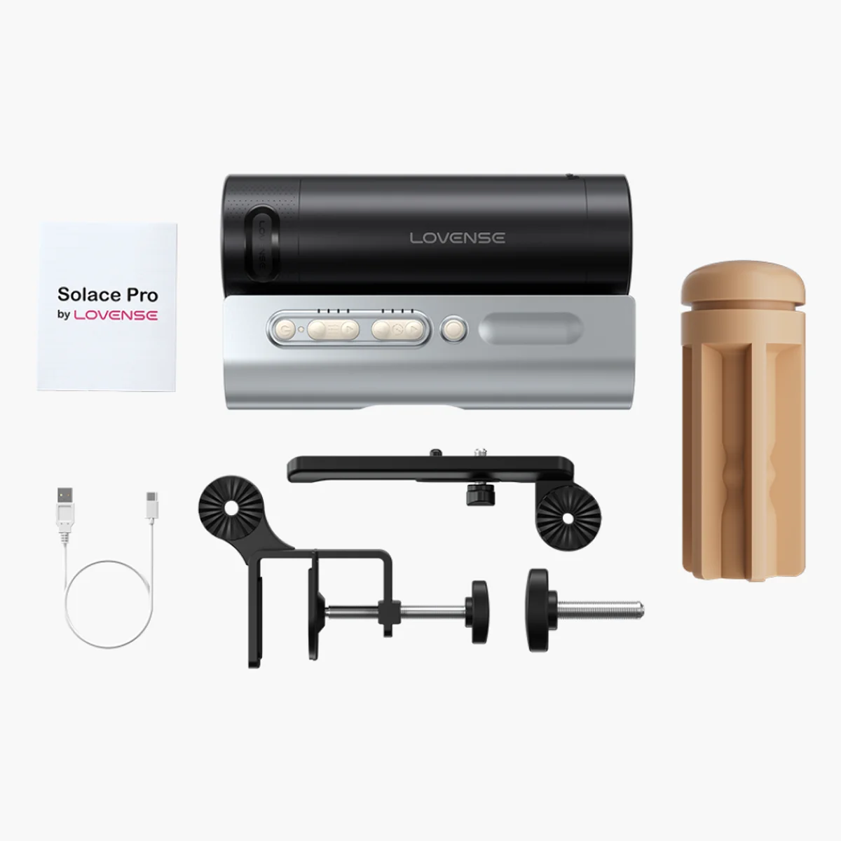 Solace Pro med beslag, ladekabel, manual og medfølgende dele. Producentfoto: Lovense.