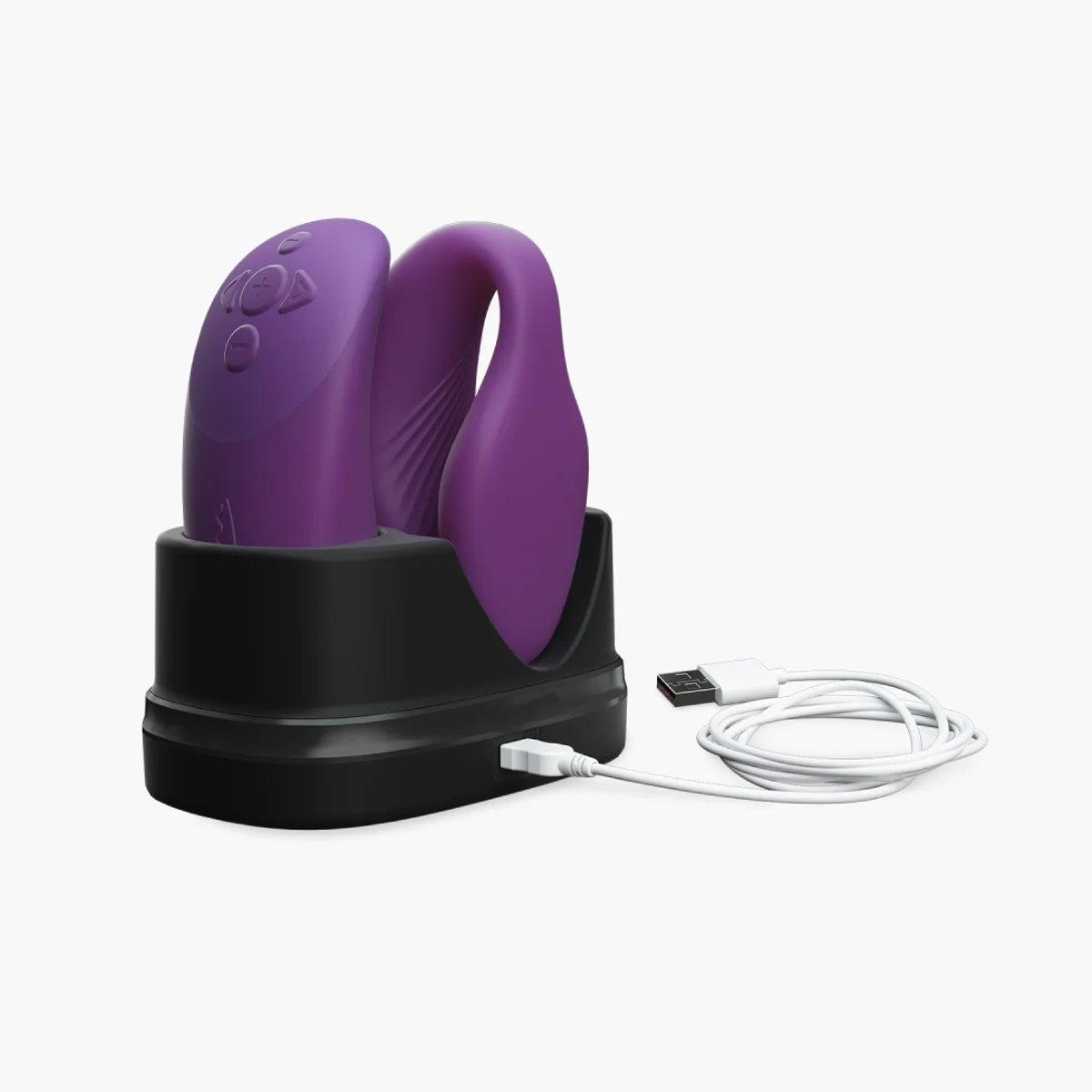 Lilla We-Vibe Chorus og fjernbetjening i ladeholderen med kabel. Producentfoto: We-Vibe.