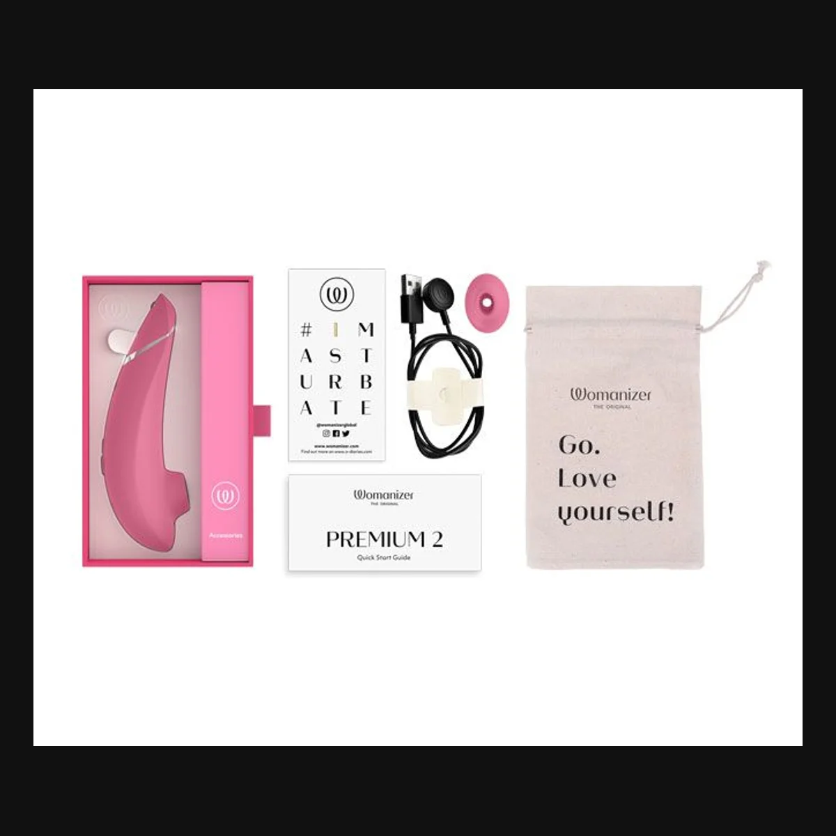 Womanizer Premium 2 i Raspberry med emballage, opbevaringspose og tilbehør lagt frem. Producentfoto: Womanizer.